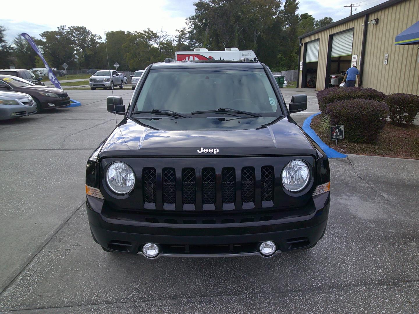 2016 BLACK JEEP PATRIOT LATITUDE (1C4NJPFA0GD) , located at 10405 Abercorn Street, Savannah, GA, 31419, (912) 921-8965, 31.988262, -81.131760 - Photo#0